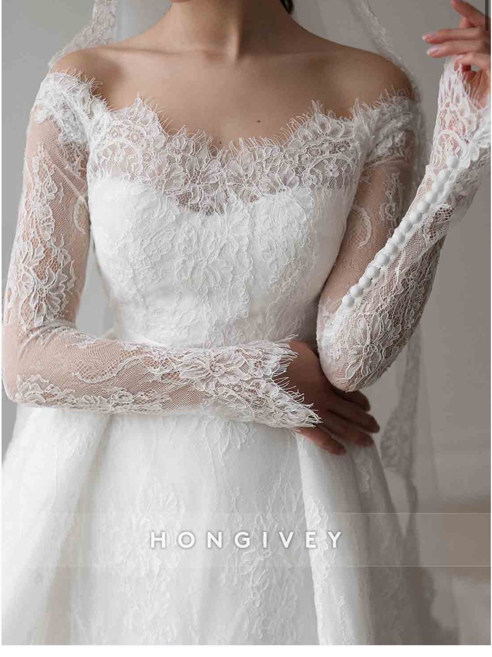 White Off-Shoulder Lace Wedding Gown